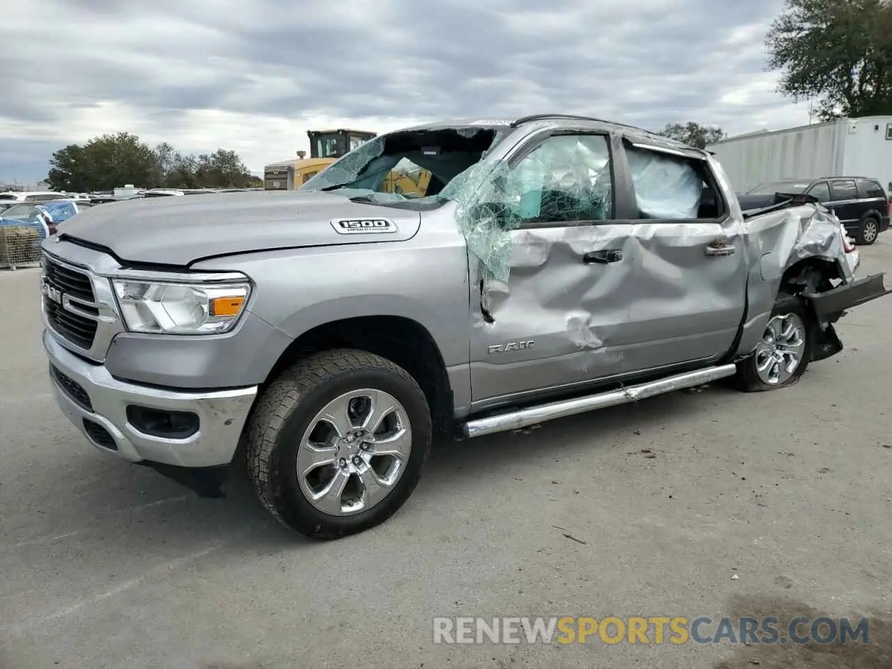 1 Photograph of a damaged car 1C6SRFFT6MN770187 RAM 1500 2021