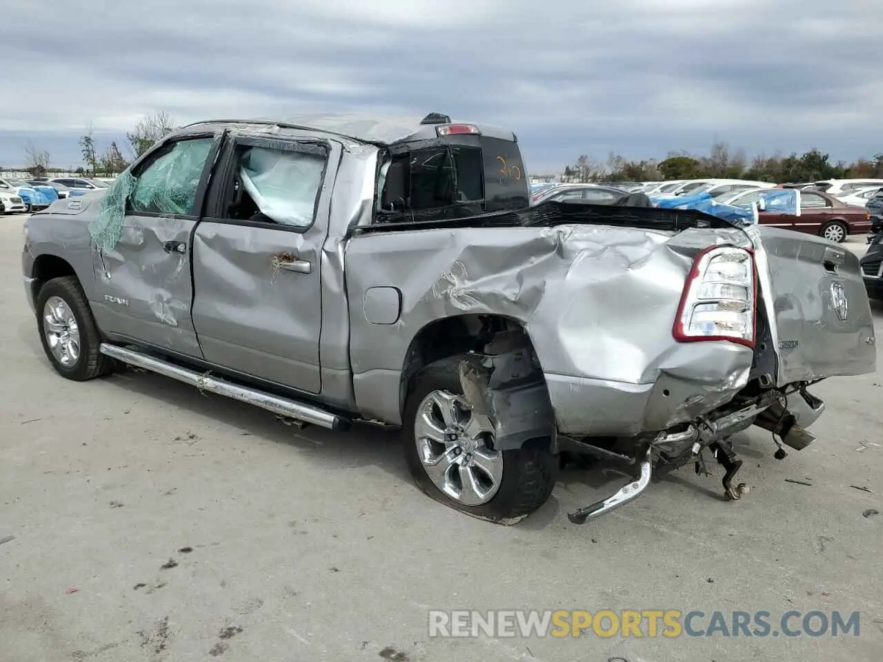 2 Photograph of a damaged car 1C6SRFFT6MN770187 RAM 1500 2021
