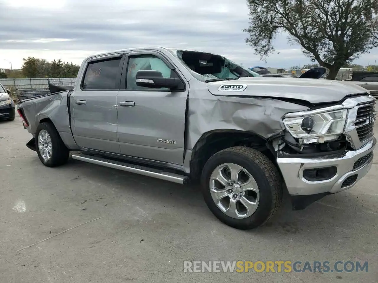 4 Photograph of a damaged car 1C6SRFFT6MN770187 RAM 1500 2021