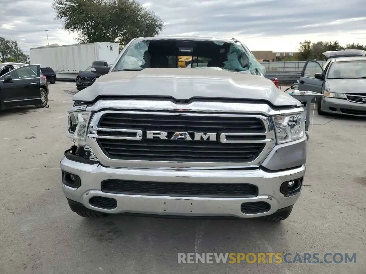 5 Photograph of a damaged car 1C6SRFFT6MN770187 RAM 1500 2021