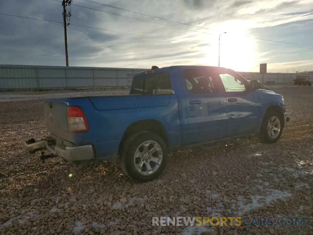 3 Photograph of a damaged car 1C6SRFFT6MN825933 RAM 1500 2021