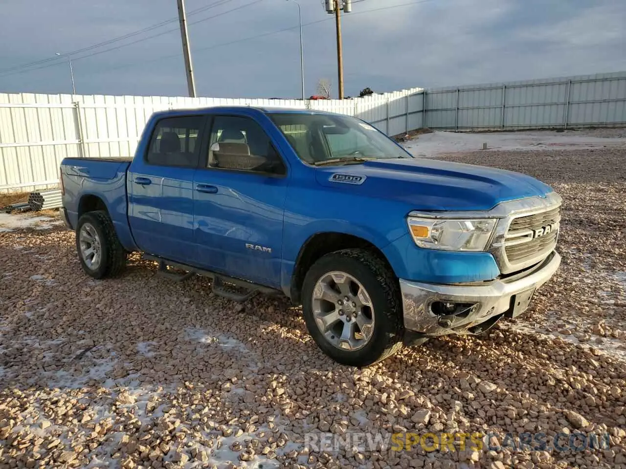 4 Photograph of a damaged car 1C6SRFFT6MN825933 RAM 1500 2021