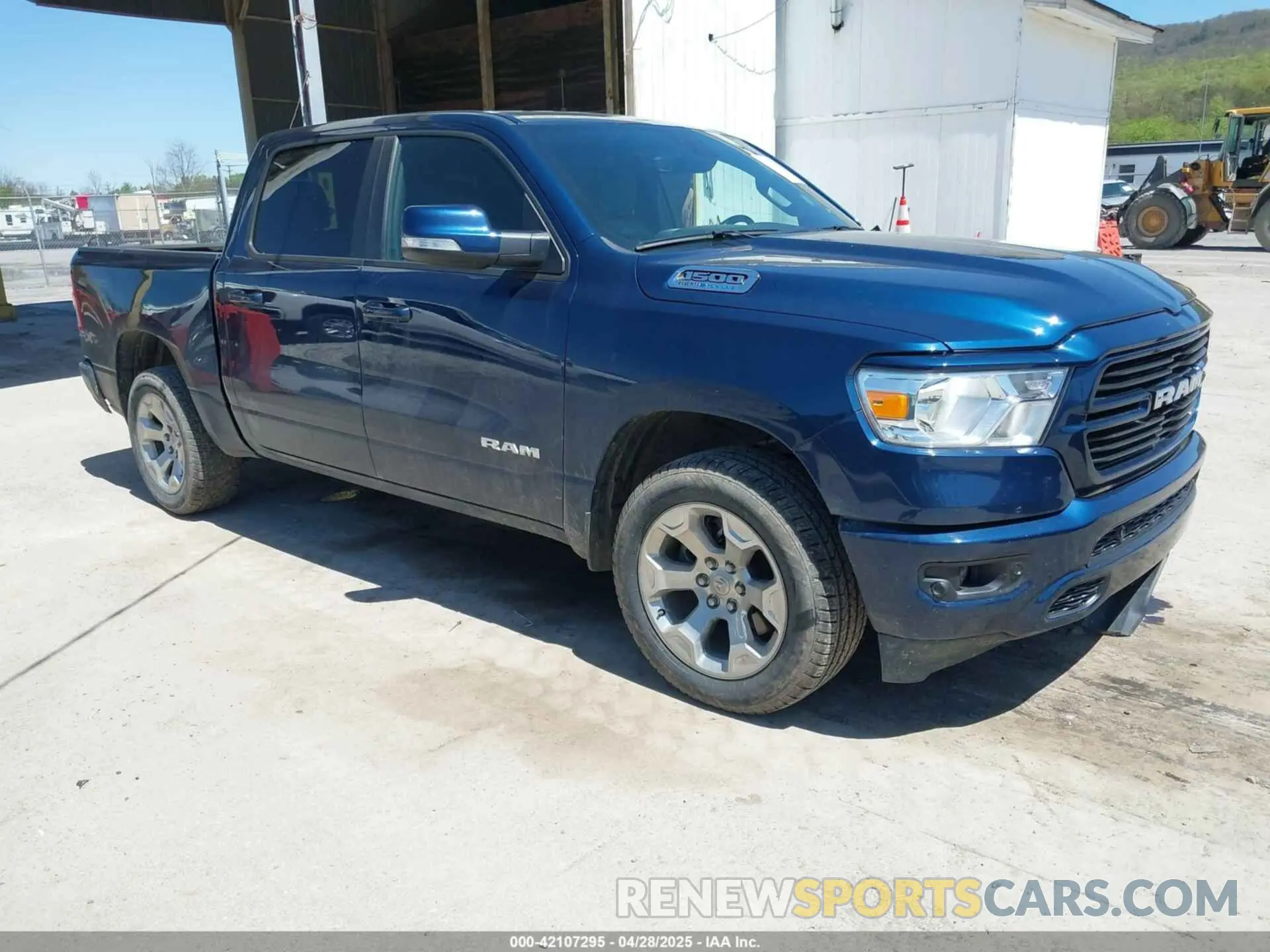 1 Photograph of a damaged car 1C6SRFFT6MN827214 RAM 1500 2021