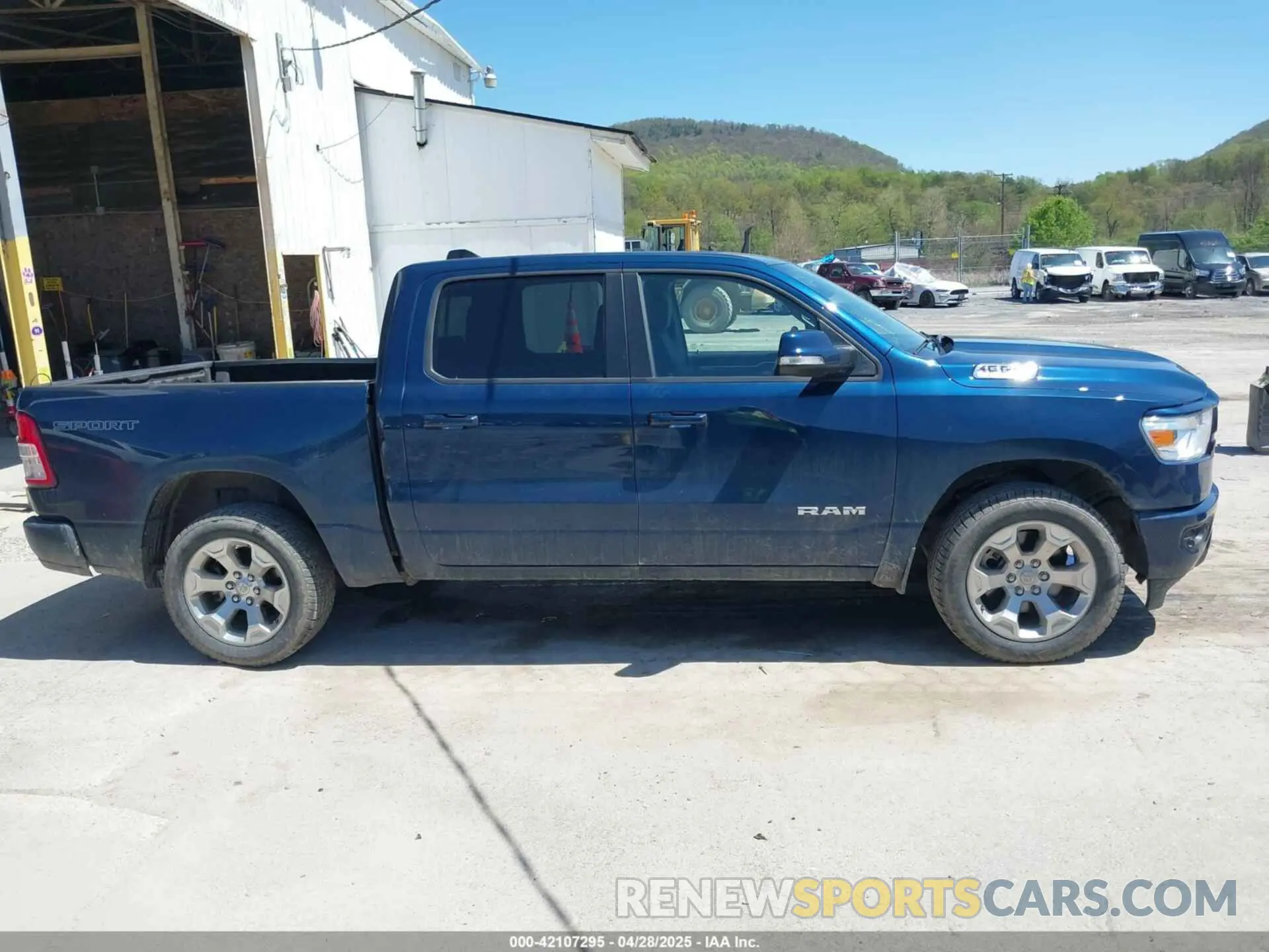 13 Photograph of a damaged car 1C6SRFFT6MN827214 RAM 1500 2021
