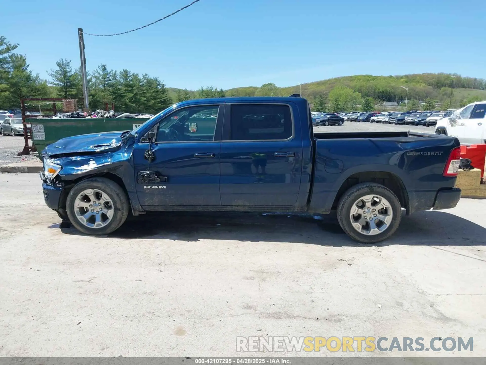 14 Photograph of a damaged car 1C6SRFFT6MN827214 RAM 1500 2021