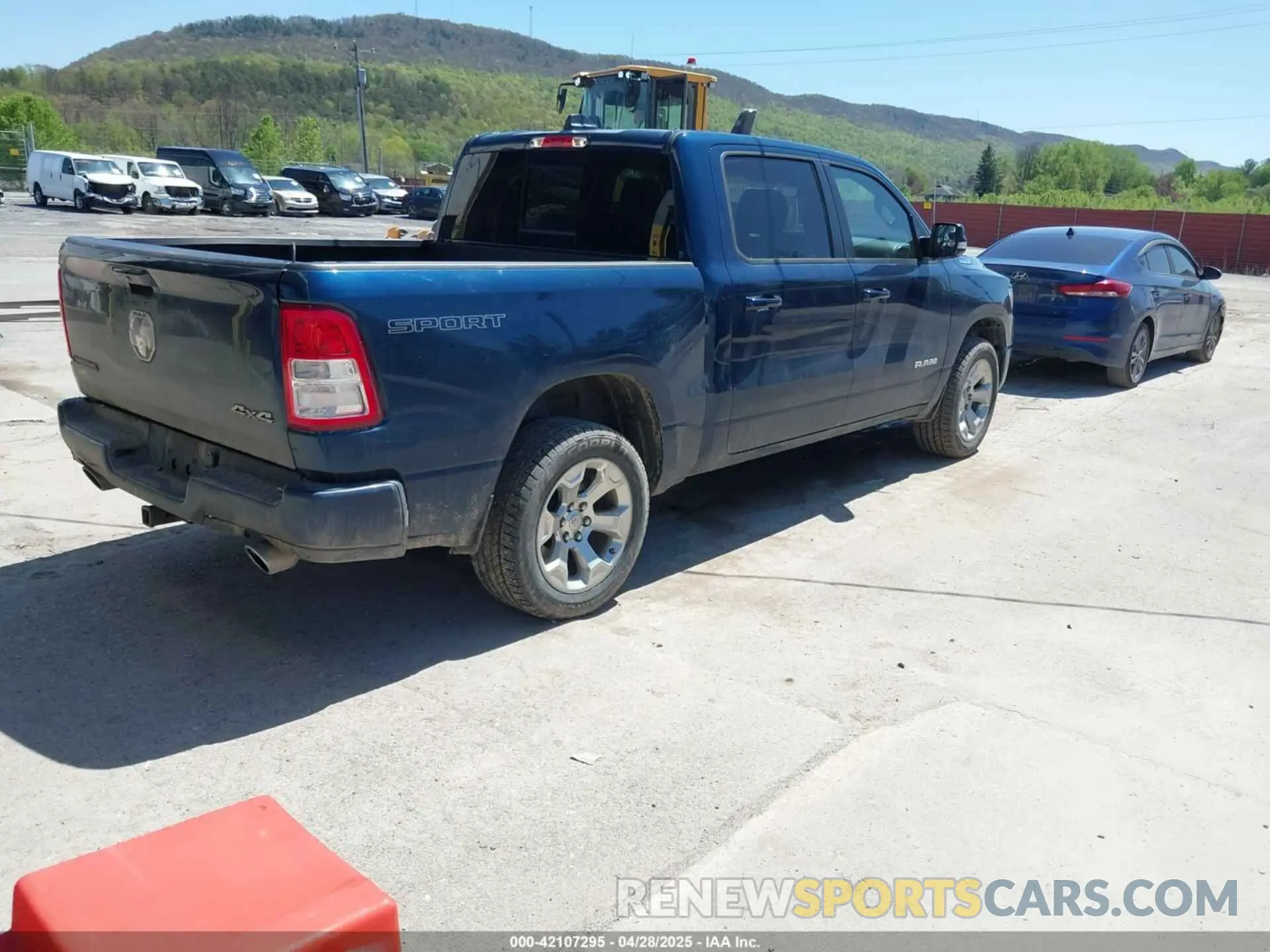 4 Photograph of a damaged car 1C6SRFFT6MN827214 RAM 1500 2021