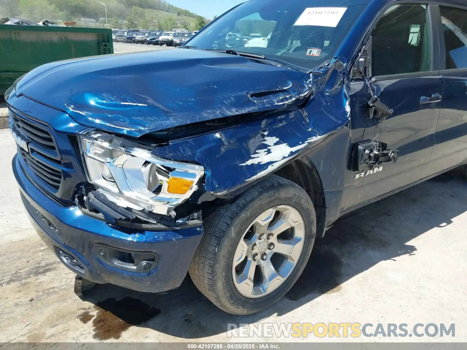 6 Photograph of a damaged car 1C6SRFFT6MN827214 RAM 1500 2021