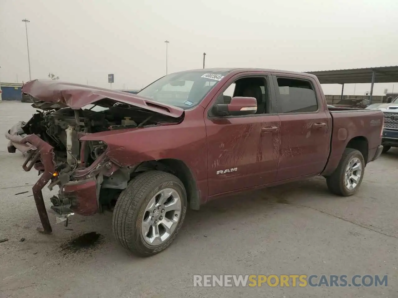1 Photograph of a damaged car 1C6SRFFT7MN505066 RAM 1500 2021