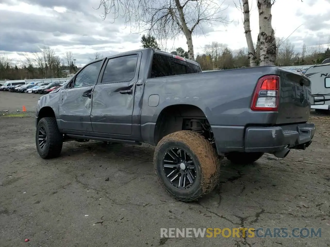 2 Photograph of a damaged car 1C6SRFFT7MN511174 RAM 1500 2021