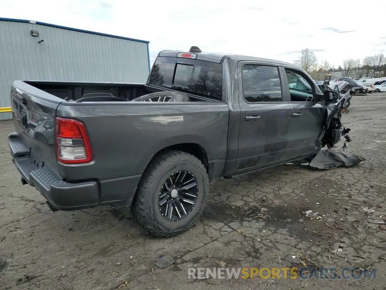 3 Photograph of a damaged car 1C6SRFFT7MN511174 RAM 1500 2021