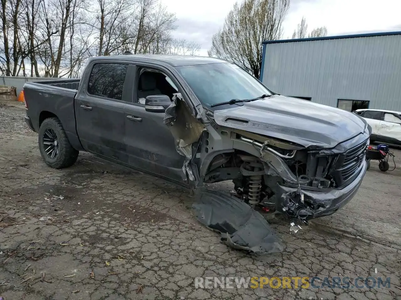 4 Photograph of a damaged car 1C6SRFFT7MN511174 RAM 1500 2021