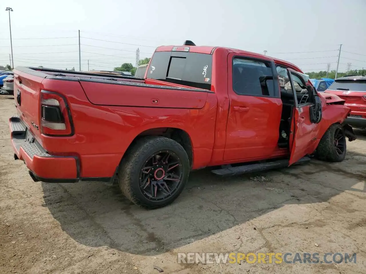 3 Photograph of a damaged car 1C6SRFFT7MN573173 RAM 1500 2021