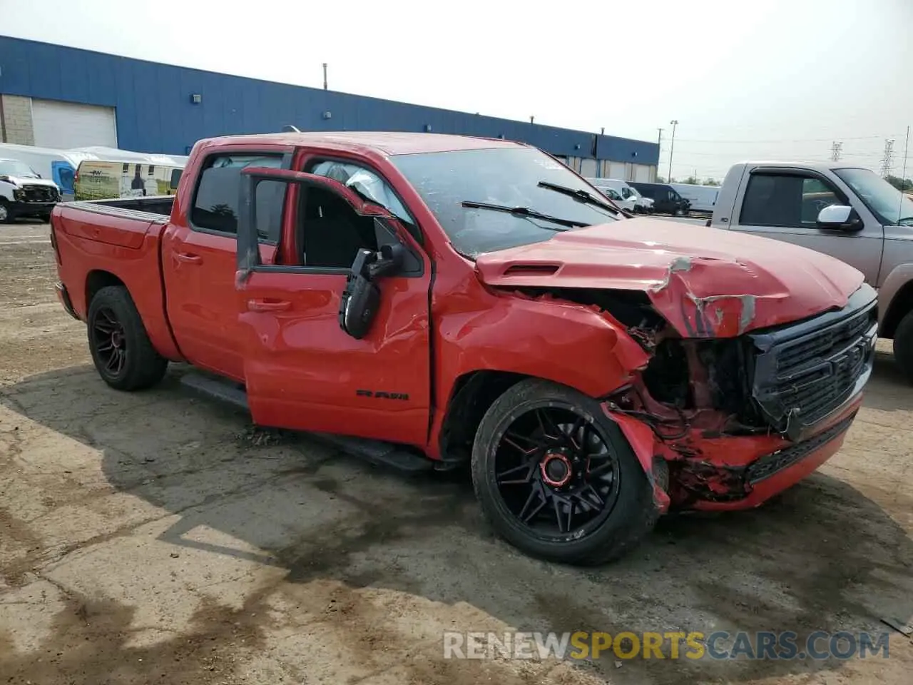 4 Photograph of a damaged car 1C6SRFFT7MN573173 RAM 1500 2021
