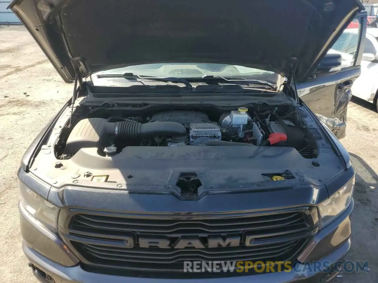 11 Photograph of a damaged car 1C6SRFFT7MN576011 RAM 1500 2021