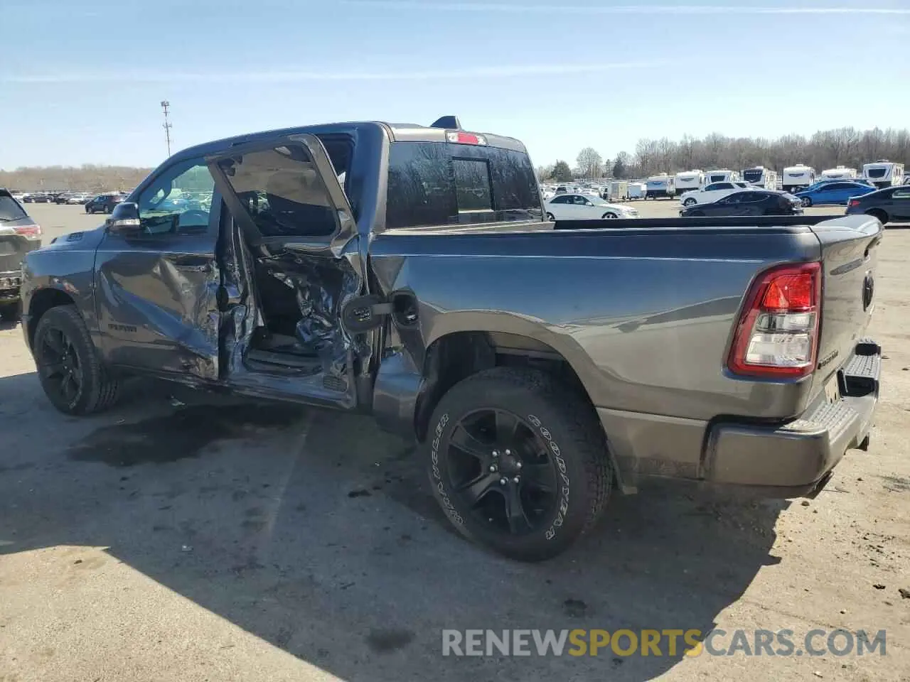 2 Photograph of a damaged car 1C6SRFFT7MN576011 RAM 1500 2021
