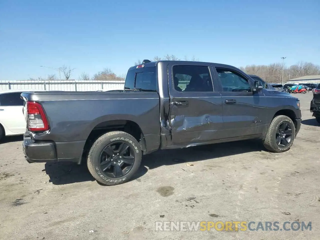 3 Photograph of a damaged car 1C6SRFFT7MN576011 RAM 1500 2021
