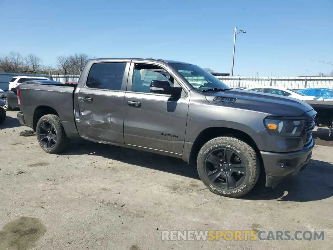 4 Photograph of a damaged car 1C6SRFFT7MN576011 RAM 1500 2021
