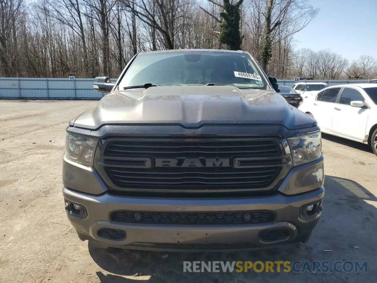 5 Photograph of a damaged car 1C6SRFFT7MN576011 RAM 1500 2021