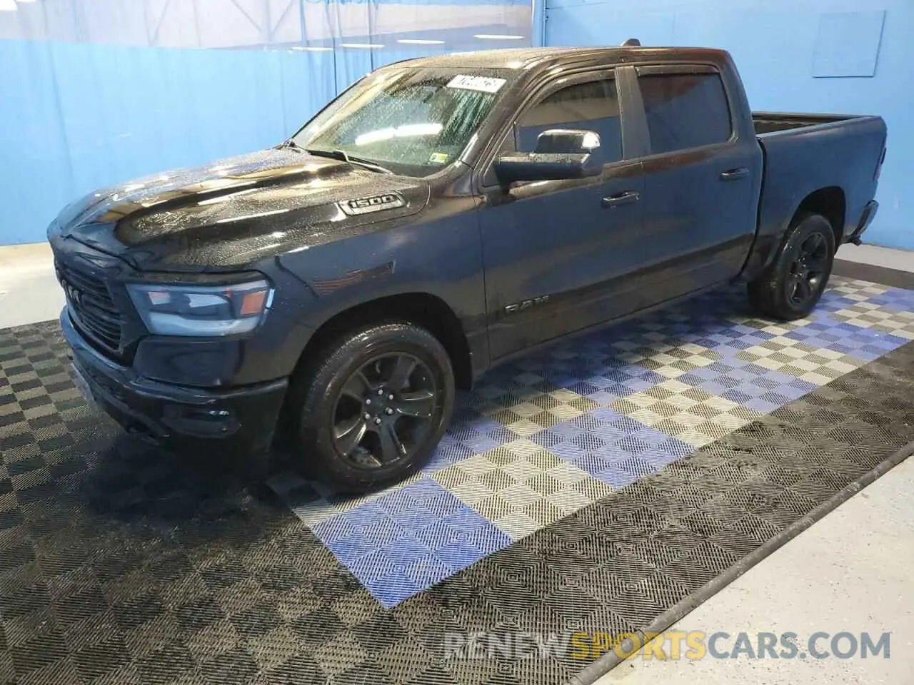 1 Photograph of a damaged car 1C6SRFFT7MN584156 RAM 1500 2021