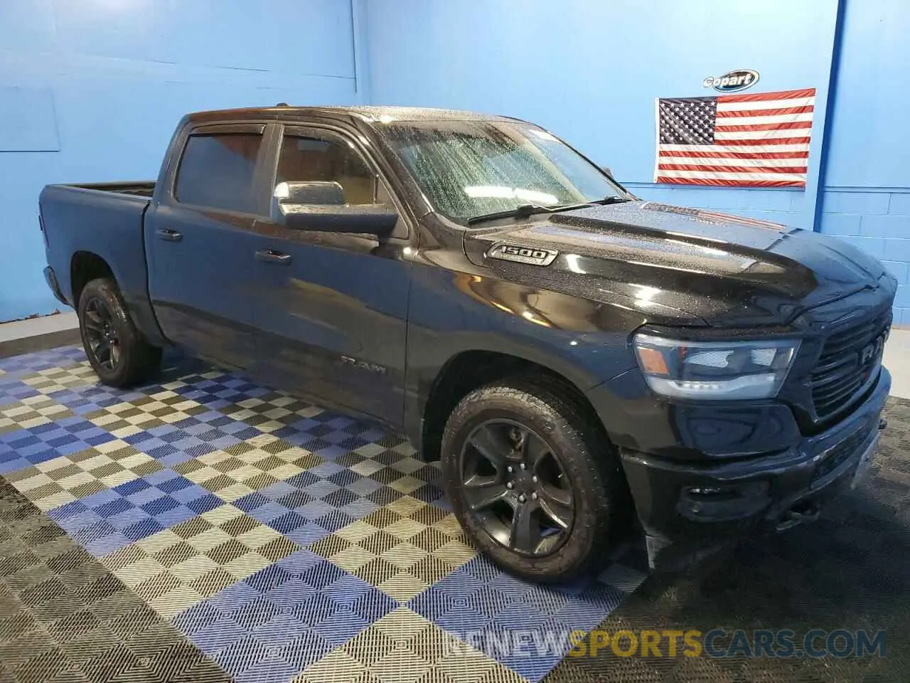 4 Photograph of a damaged car 1C6SRFFT7MN584156 RAM 1500 2021