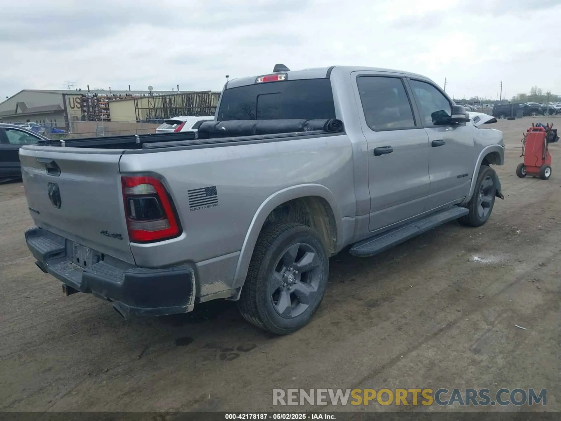 4 Photograph of a damaged car 1C6SRFFT7MN597036 RAM 1500 2021