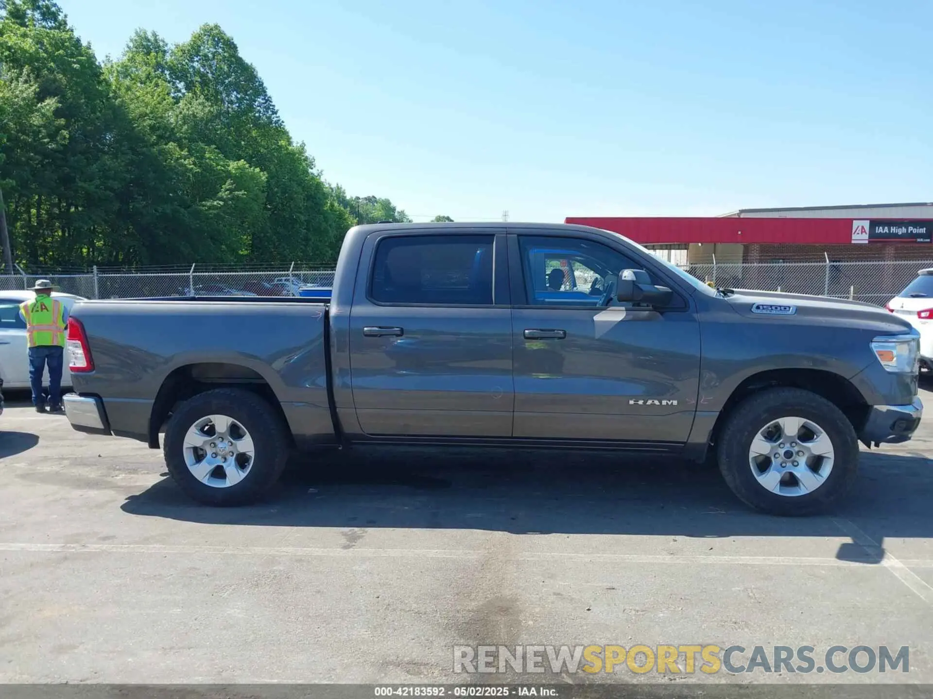 13 Photograph of a damaged car 1C6SRFFT7MN620668 RAM 1500 2021