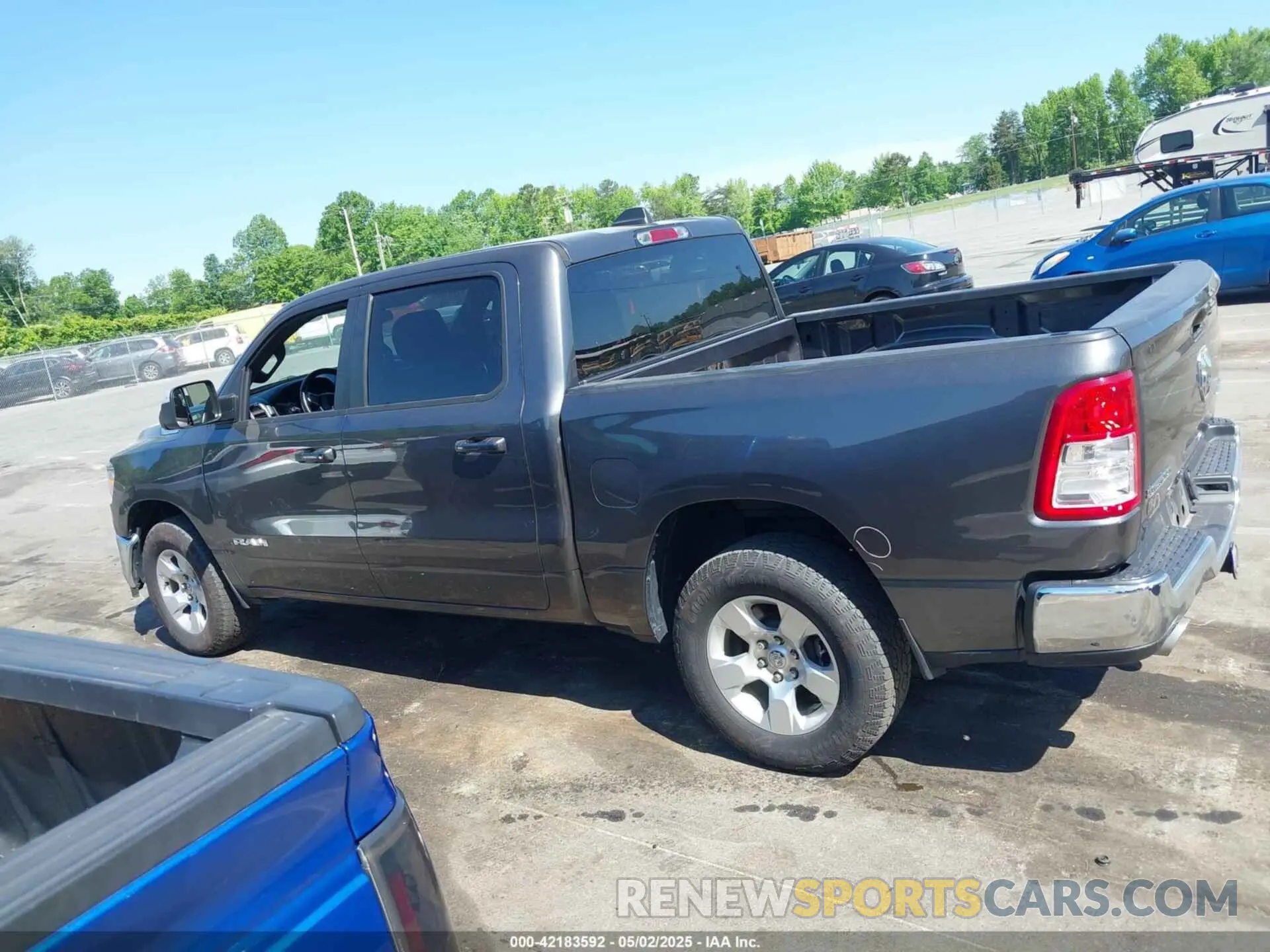 14 Photograph of a damaged car 1C6SRFFT7MN620668 RAM 1500 2021