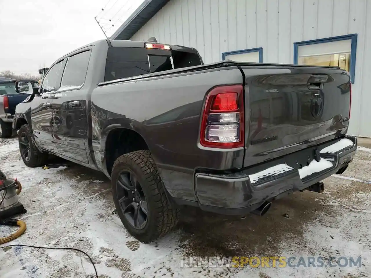 2 Photograph of a damaged car 1C6SRFFT7MN624915 RAM 1500 2021