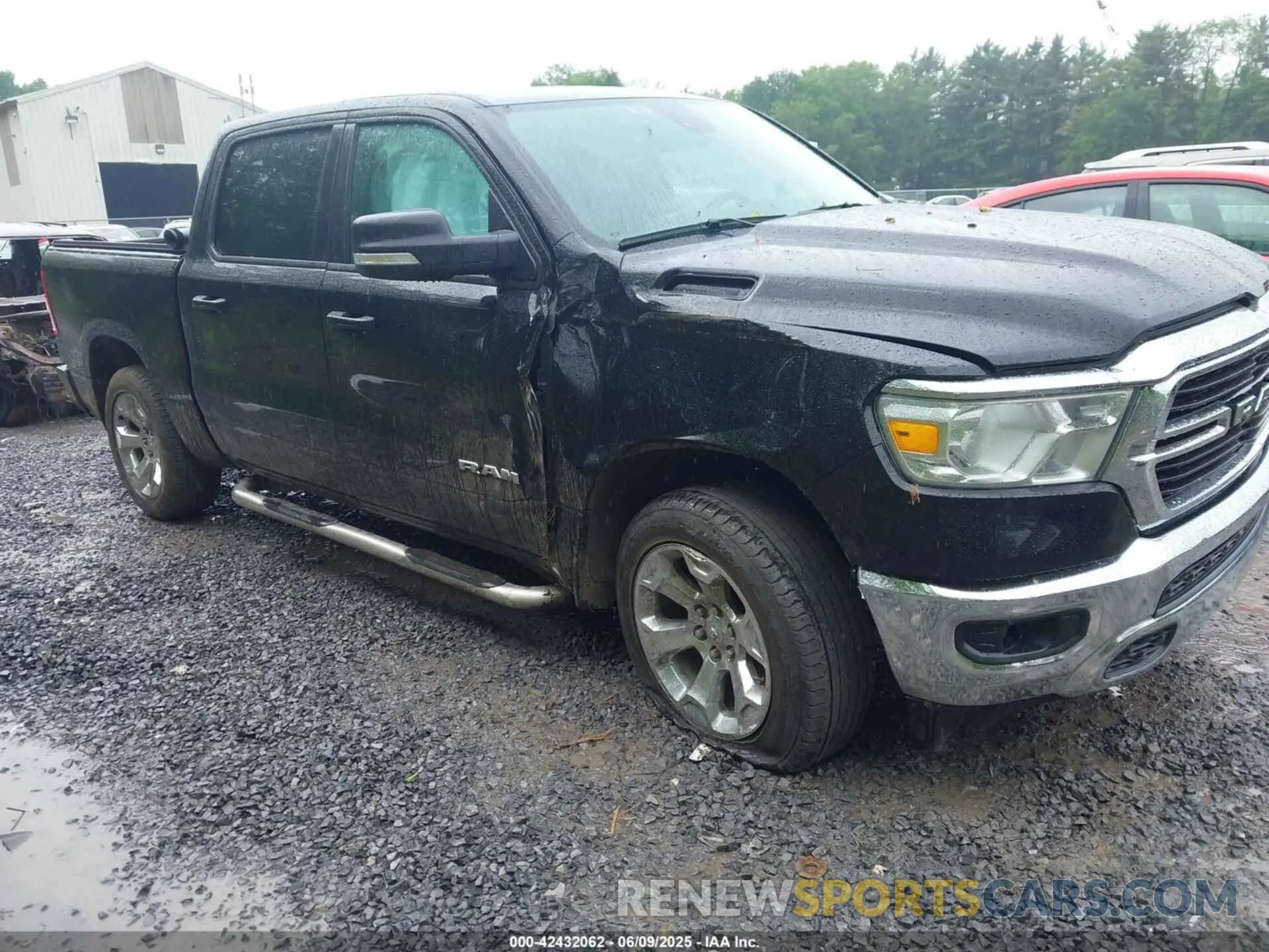 1 Photograph of a damaged car 1C6SRFFT7MN633940 RAM 1500 2021