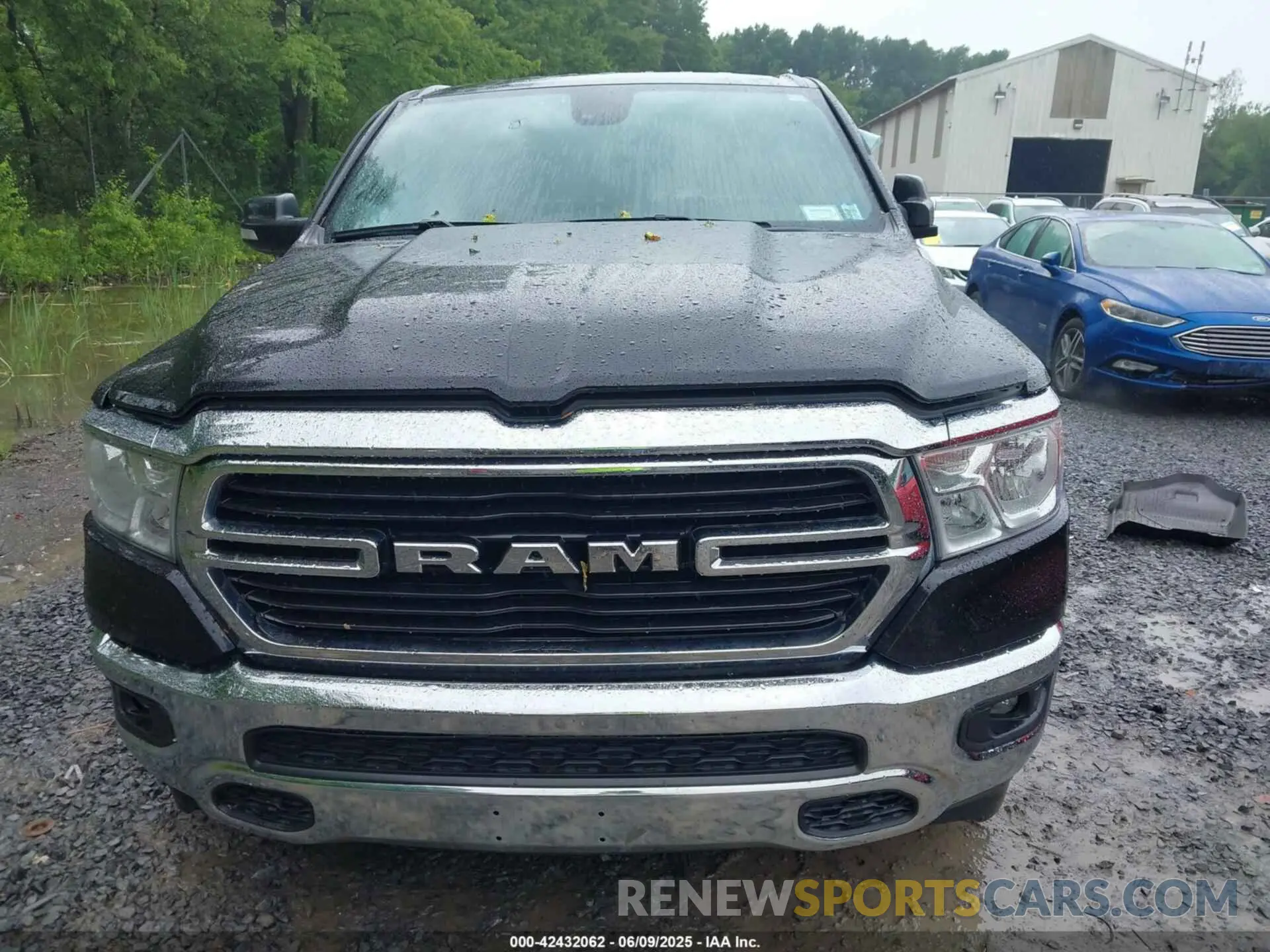12 Photograph of a damaged car 1C6SRFFT7MN633940 RAM 1500 2021