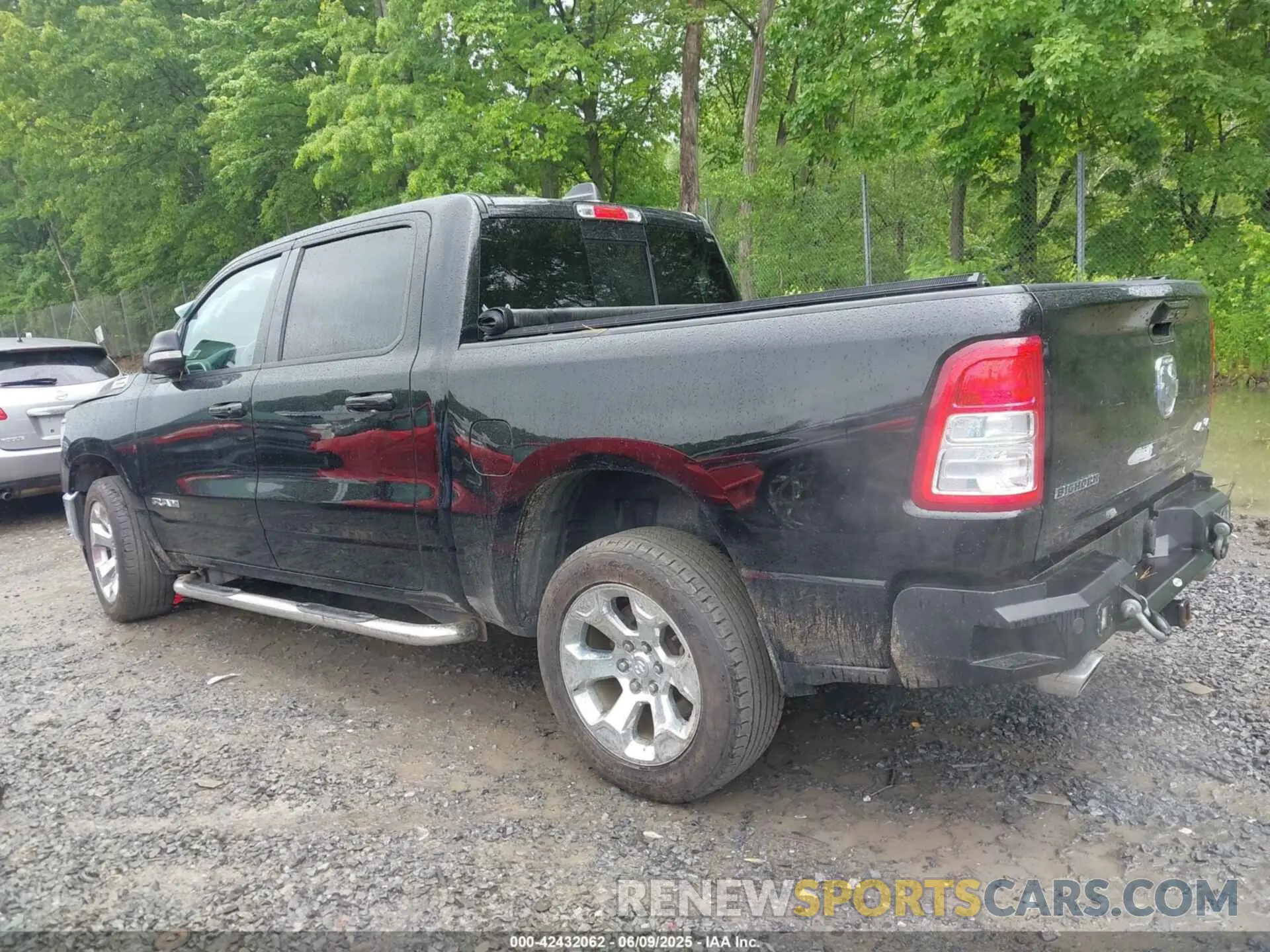 14 Photograph of a damaged car 1C6SRFFT7MN633940 RAM 1500 2021