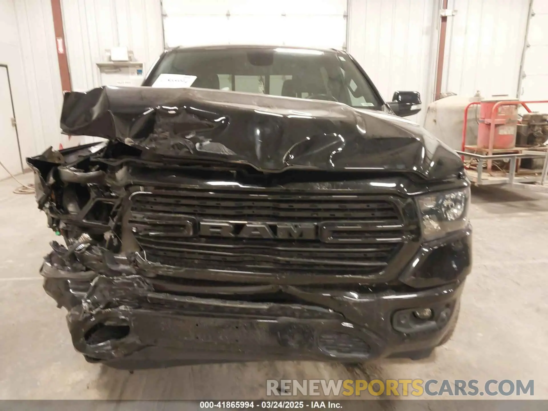 12 Photograph of a damaged car 1C6SRFFT7MN641634 RAM 1500 2021