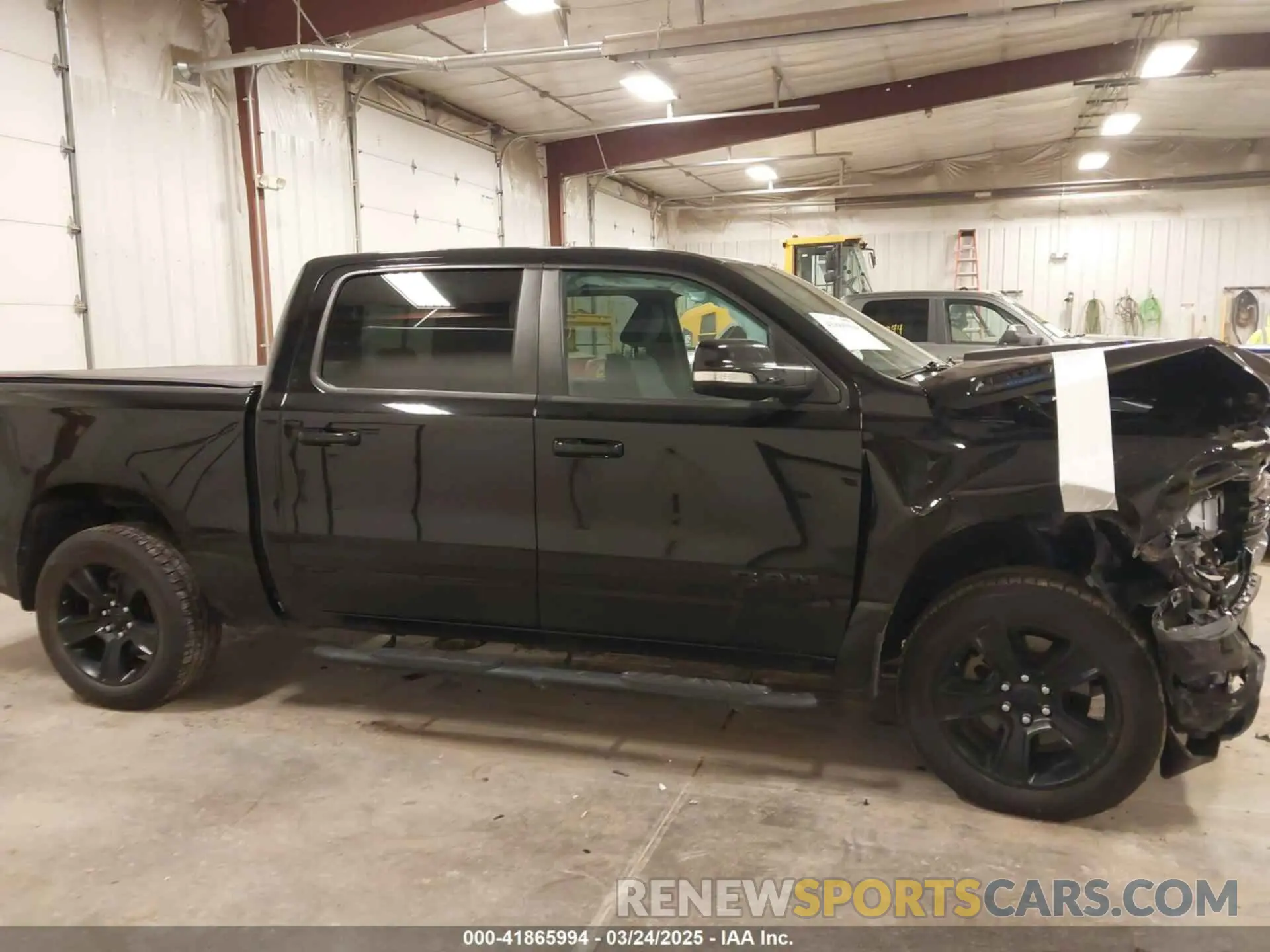 13 Photograph of a damaged car 1C6SRFFT7MN641634 RAM 1500 2021