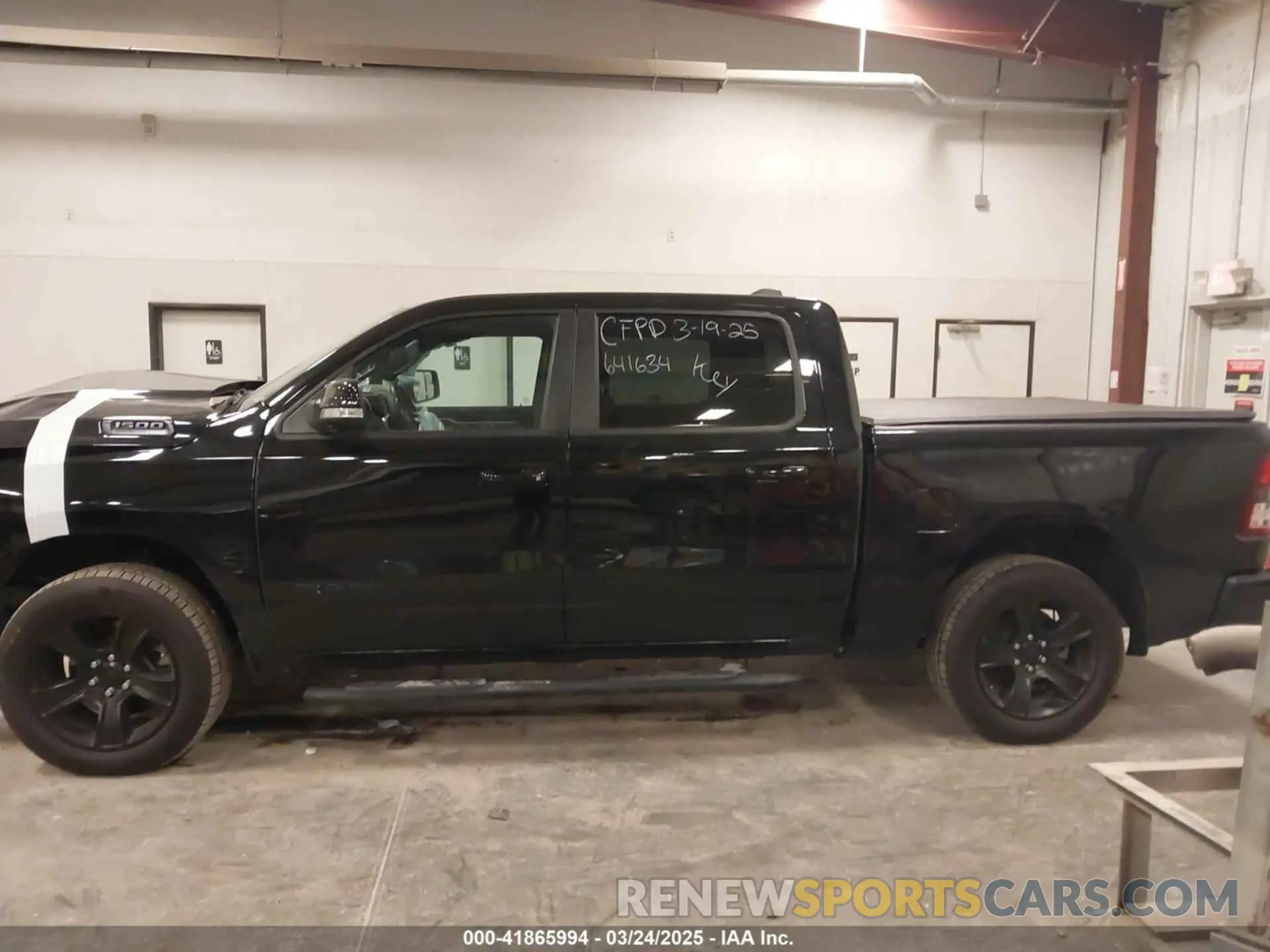 14 Photograph of a damaged car 1C6SRFFT7MN641634 RAM 1500 2021
