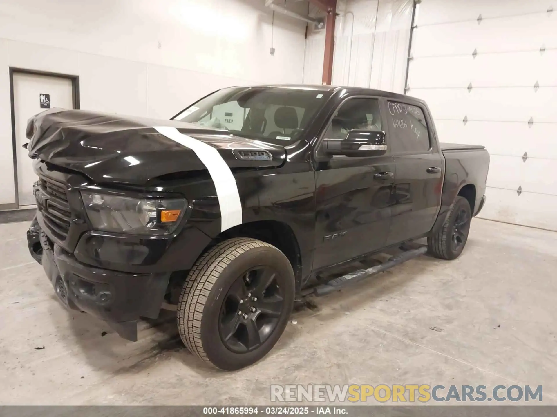2 Photograph of a damaged car 1C6SRFFT7MN641634 RAM 1500 2021