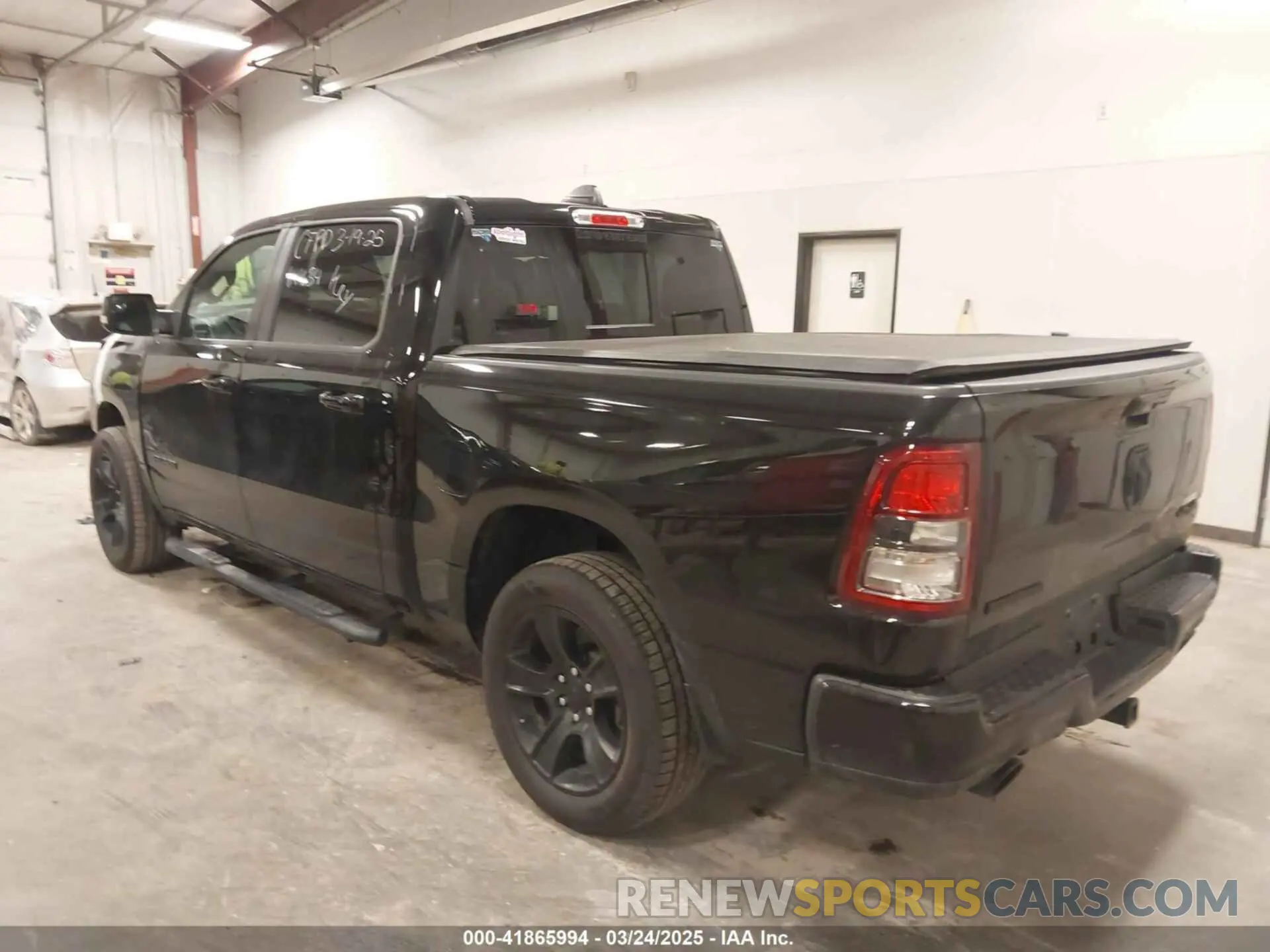 3 Photograph of a damaged car 1C6SRFFT7MN641634 RAM 1500 2021