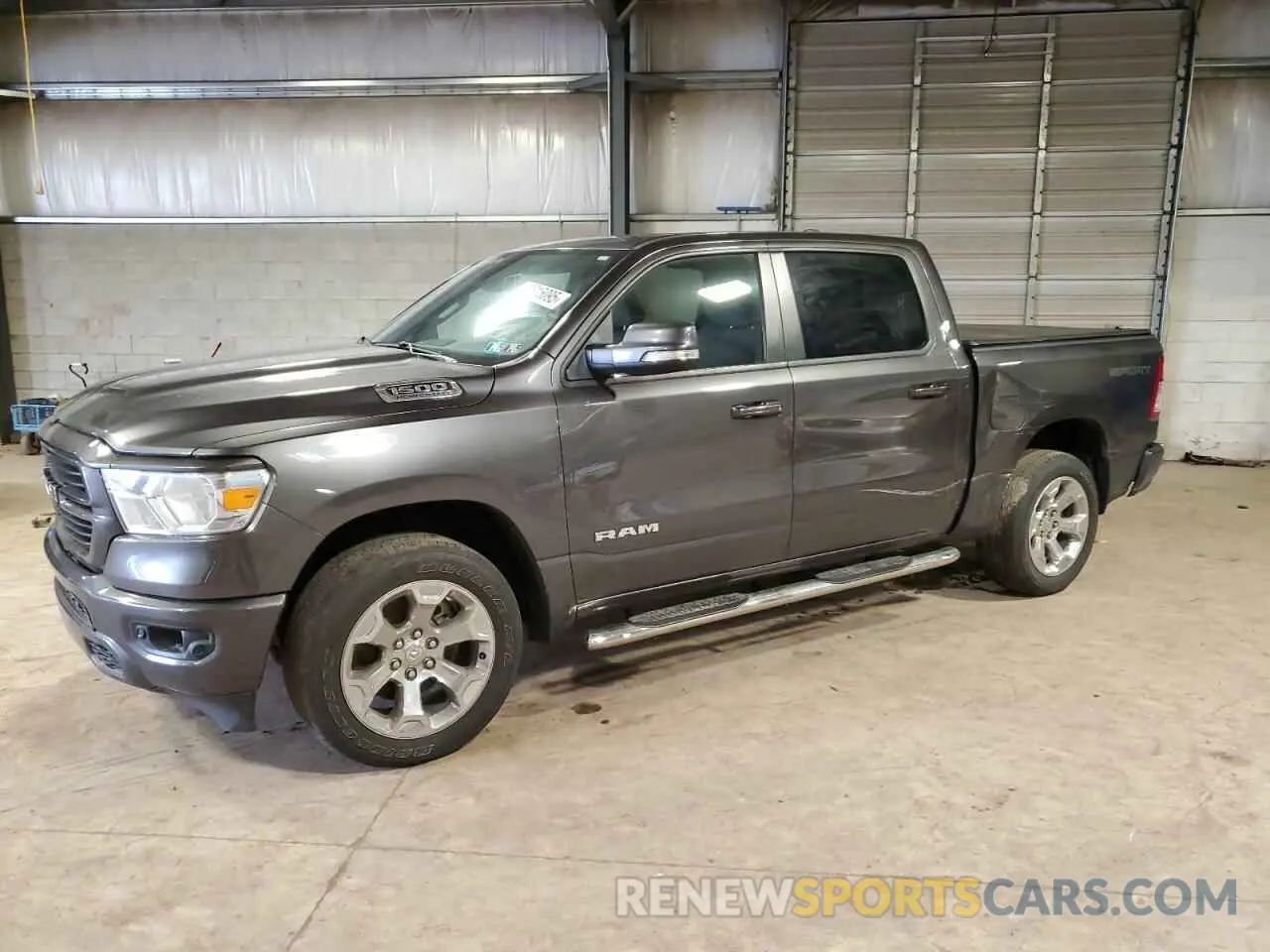 1 Photograph of a damaged car 1C6SRFFT7MN652939 RAM 1500 2021