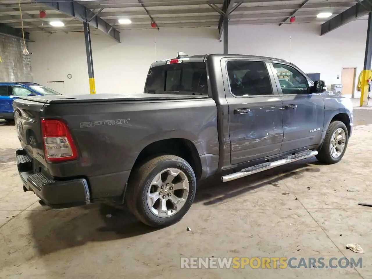 3 Photograph of a damaged car 1C6SRFFT7MN652939 RAM 1500 2021