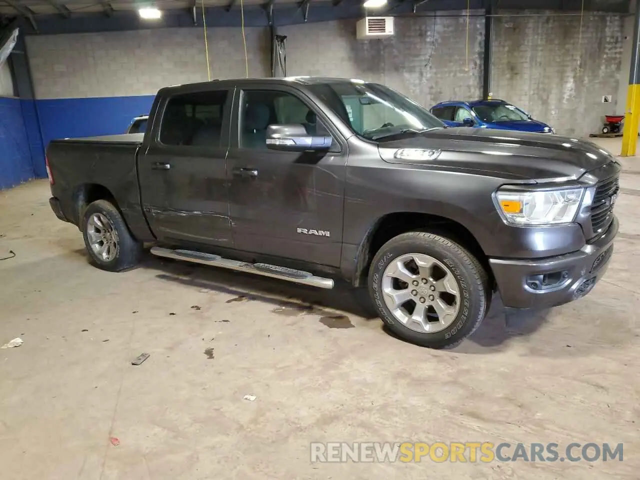 4 Photograph of a damaged car 1C6SRFFT7MN652939 RAM 1500 2021
