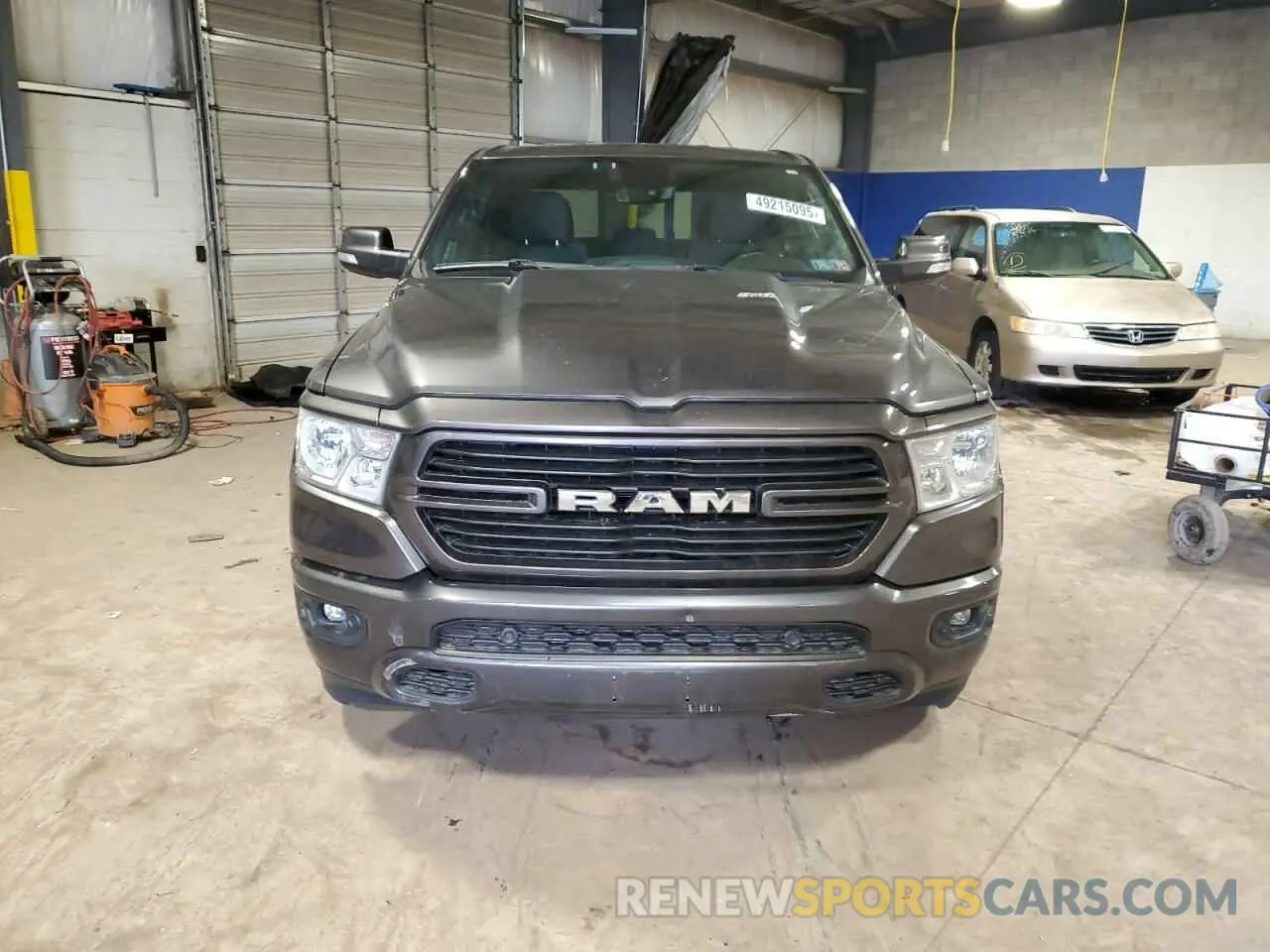 5 Photograph of a damaged car 1C6SRFFT7MN652939 RAM 1500 2021