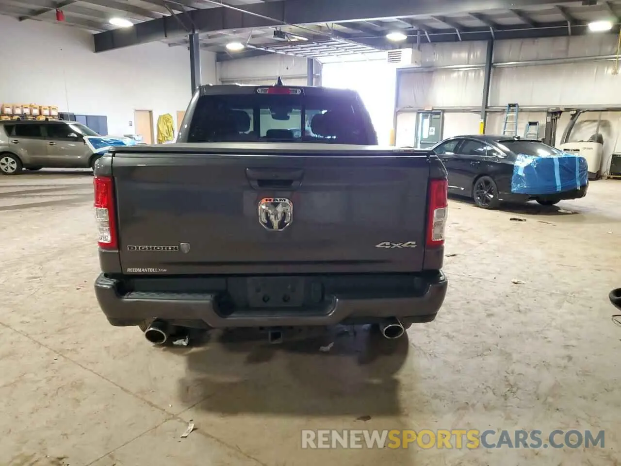 6 Photograph of a damaged car 1C6SRFFT7MN652939 RAM 1500 2021