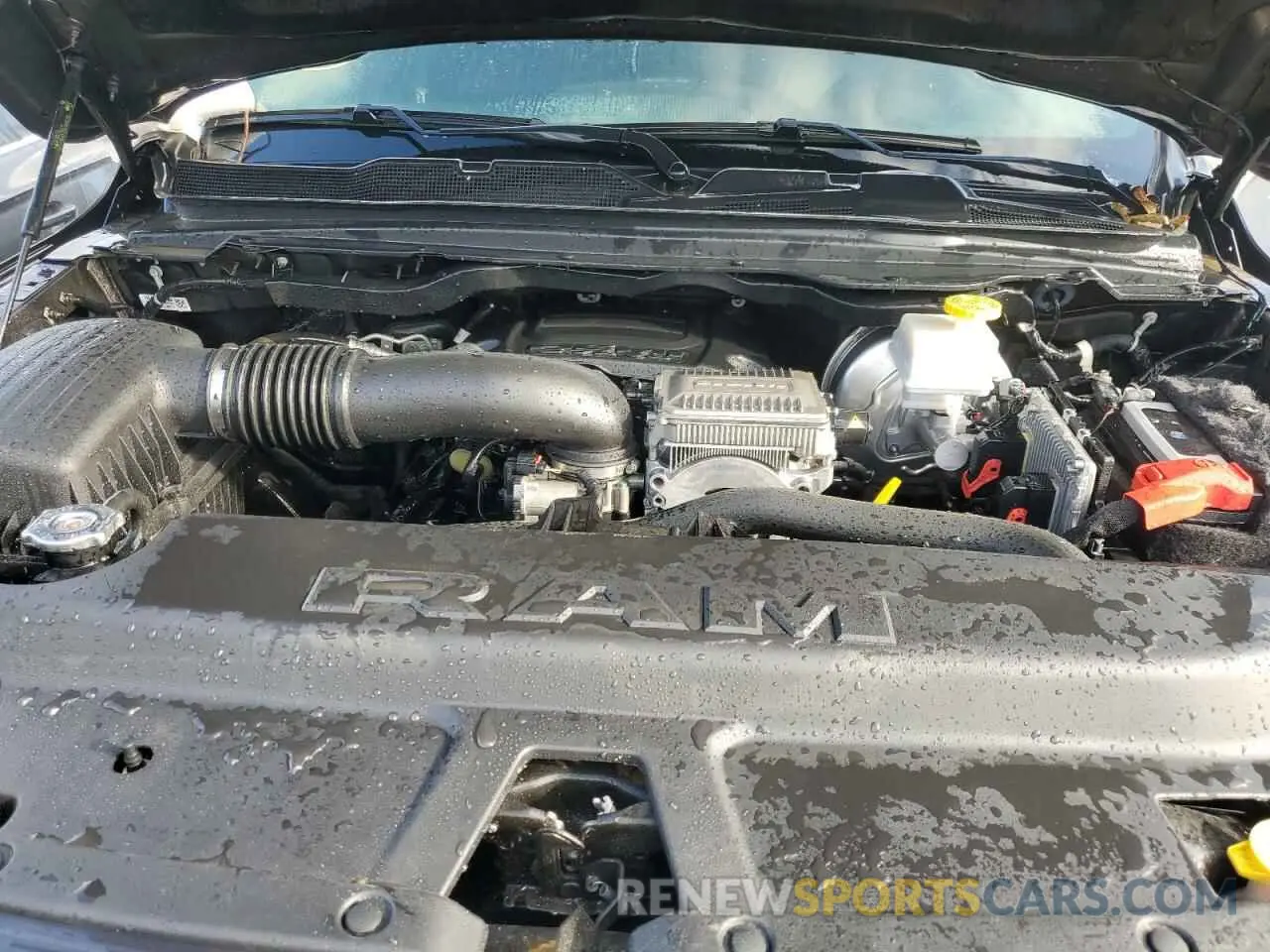 11 Photograph of a damaged car 1C6SRFFT7MN796989 RAM 1500 2021