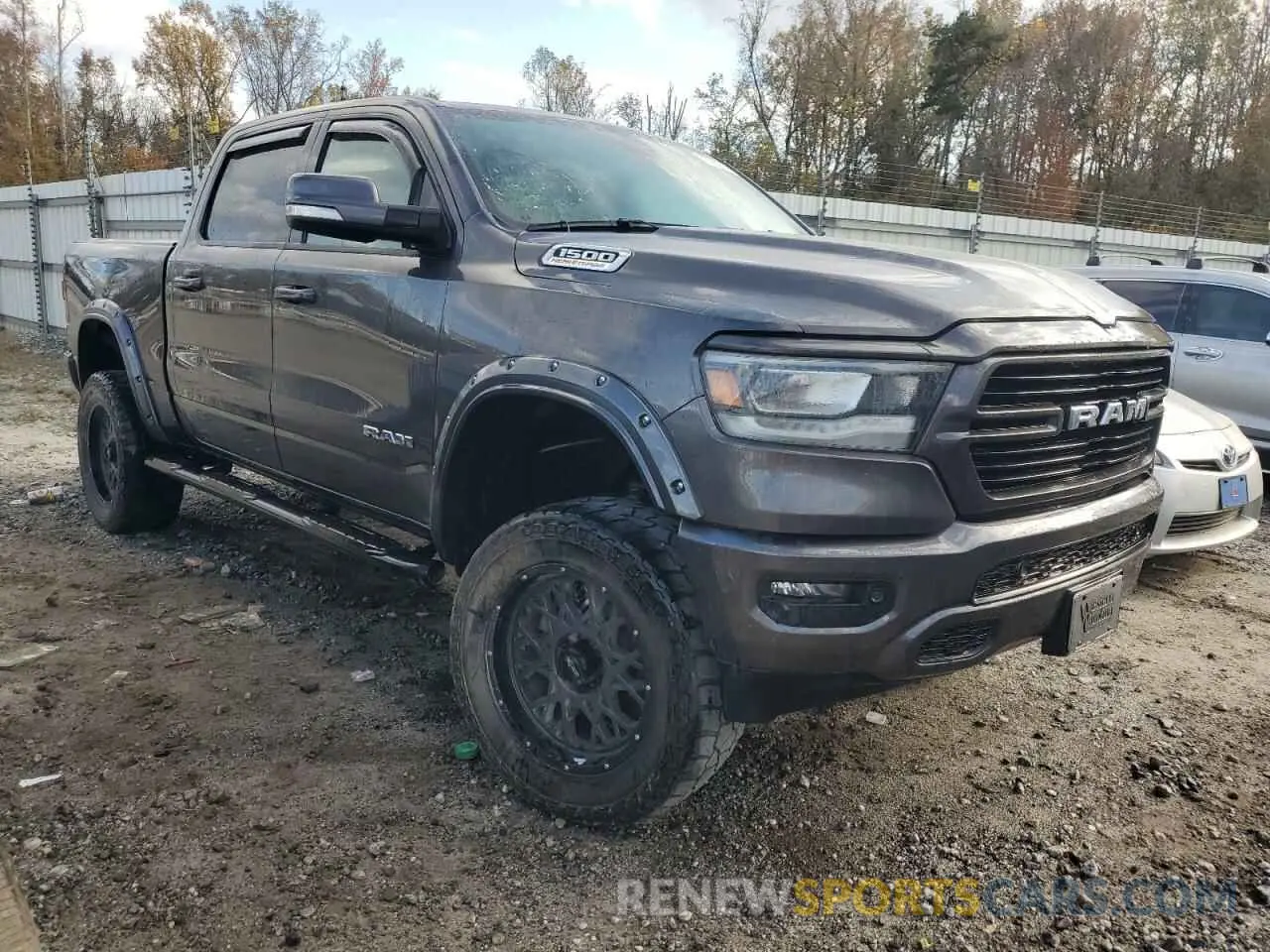4 Photograph of a damaged car 1C6SRFFT7MN796989 RAM 1500 2021