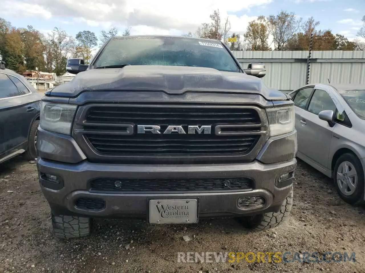 5 Photograph of a damaged car 1C6SRFFT7MN796989 RAM 1500 2021