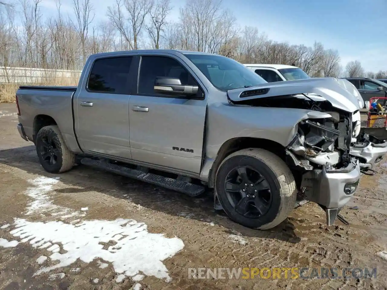 4 Photograph of a damaged car 1C6SRFFT8MN506498 RAM 1500 2021