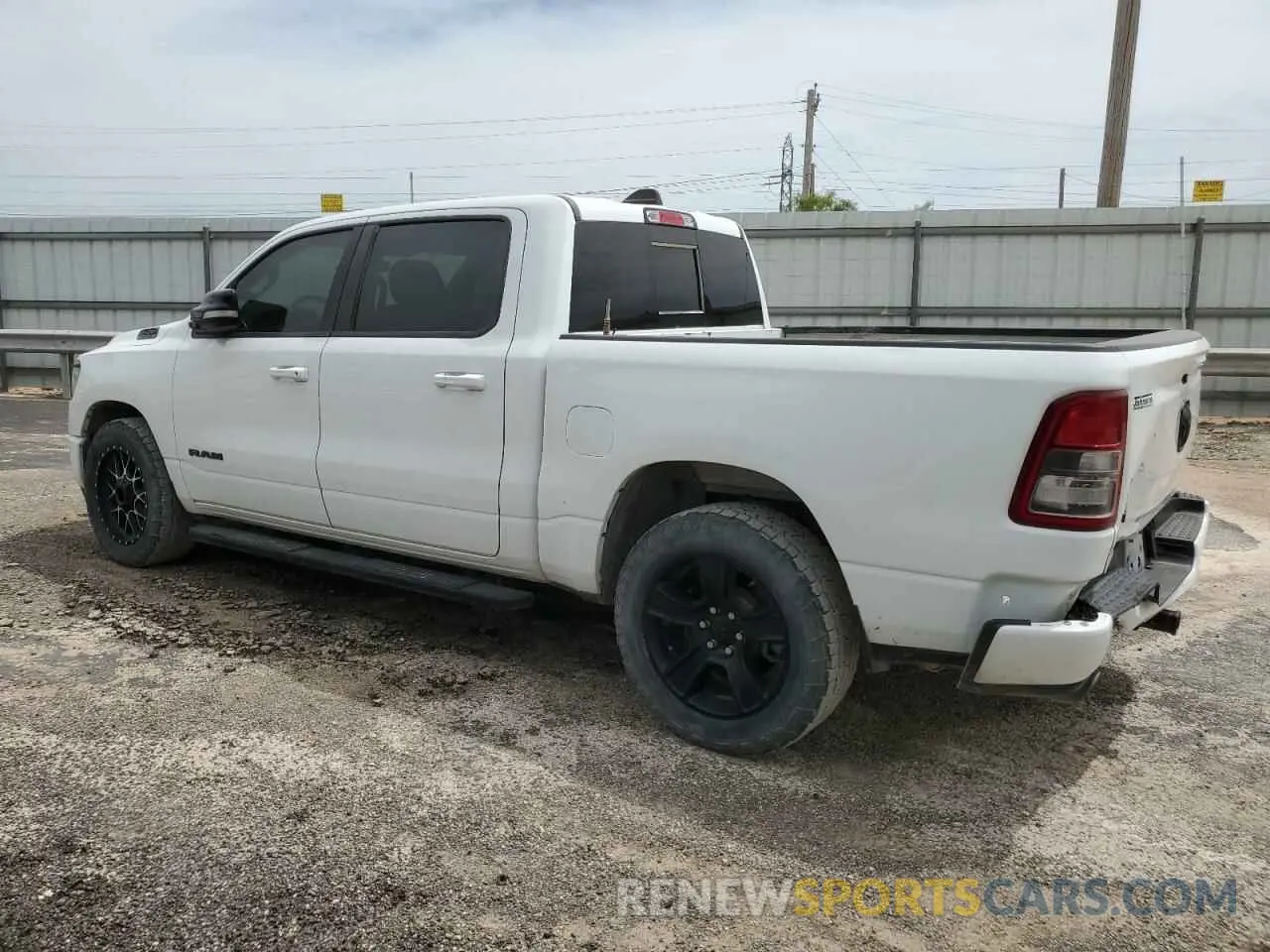 2 Photograph of a damaged car 1C6SRFFT8MN586451 RAM 1500 2021