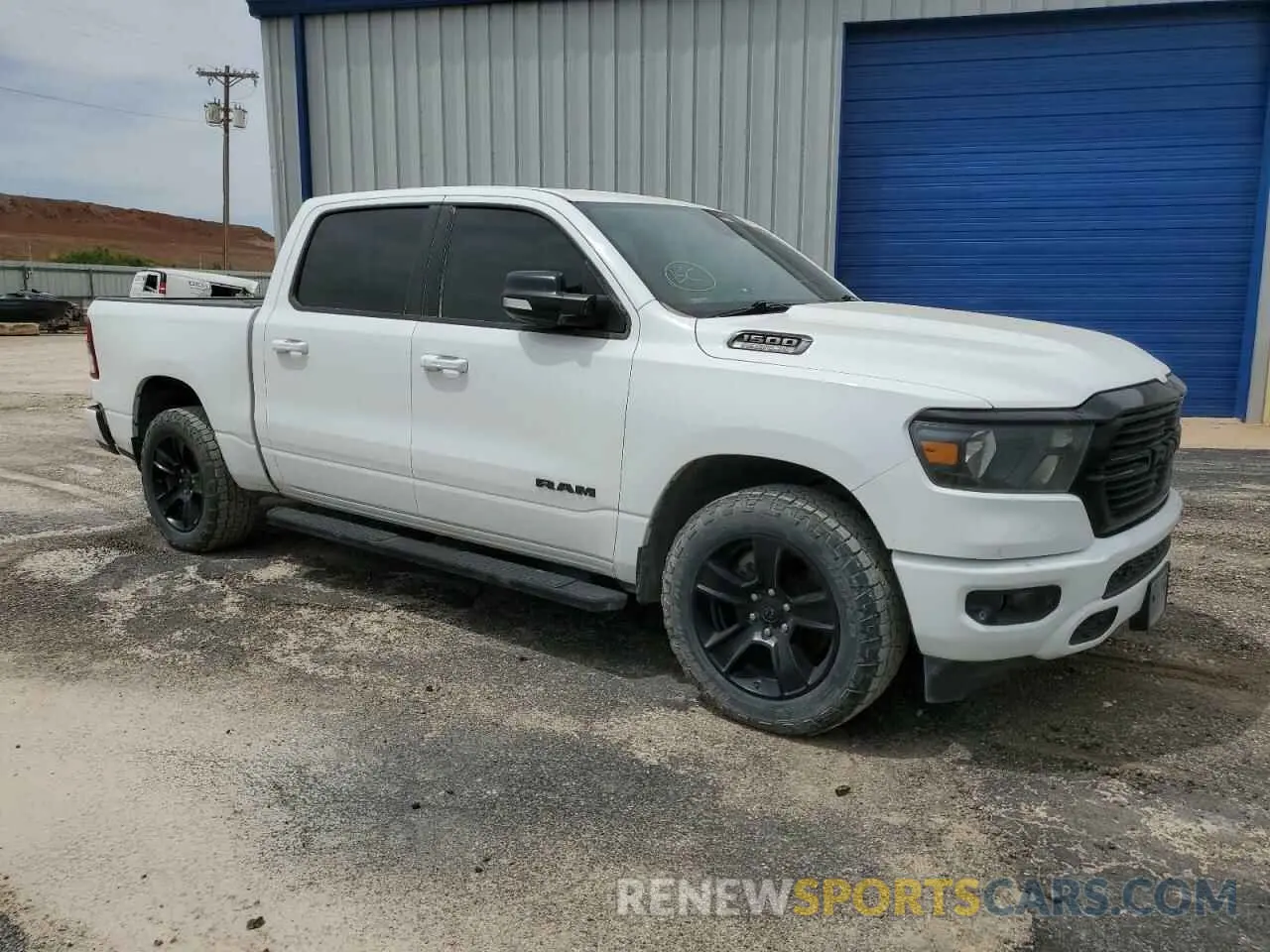 4 Photograph of a damaged car 1C6SRFFT8MN586451 RAM 1500 2021