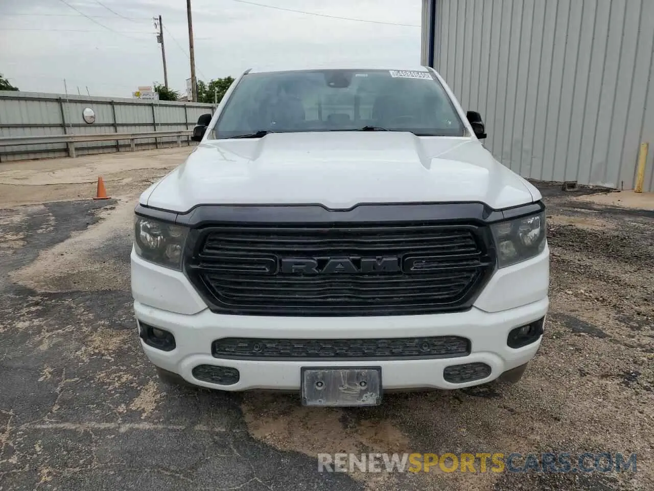 5 Photograph of a damaged car 1C6SRFFT8MN586451 RAM 1500 2021