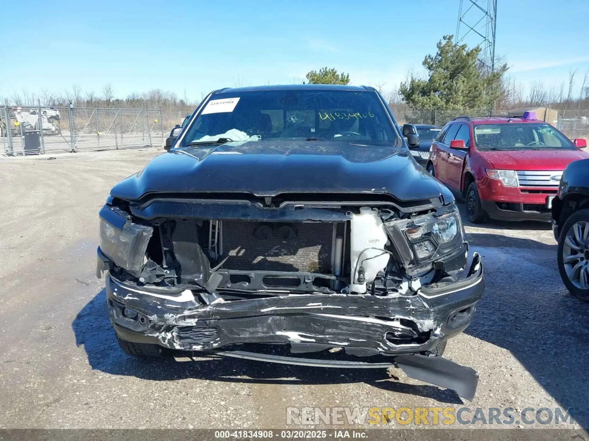 12 Photograph of a damaged car 1C6SRFFT8MN598163 RAM 1500 2021
