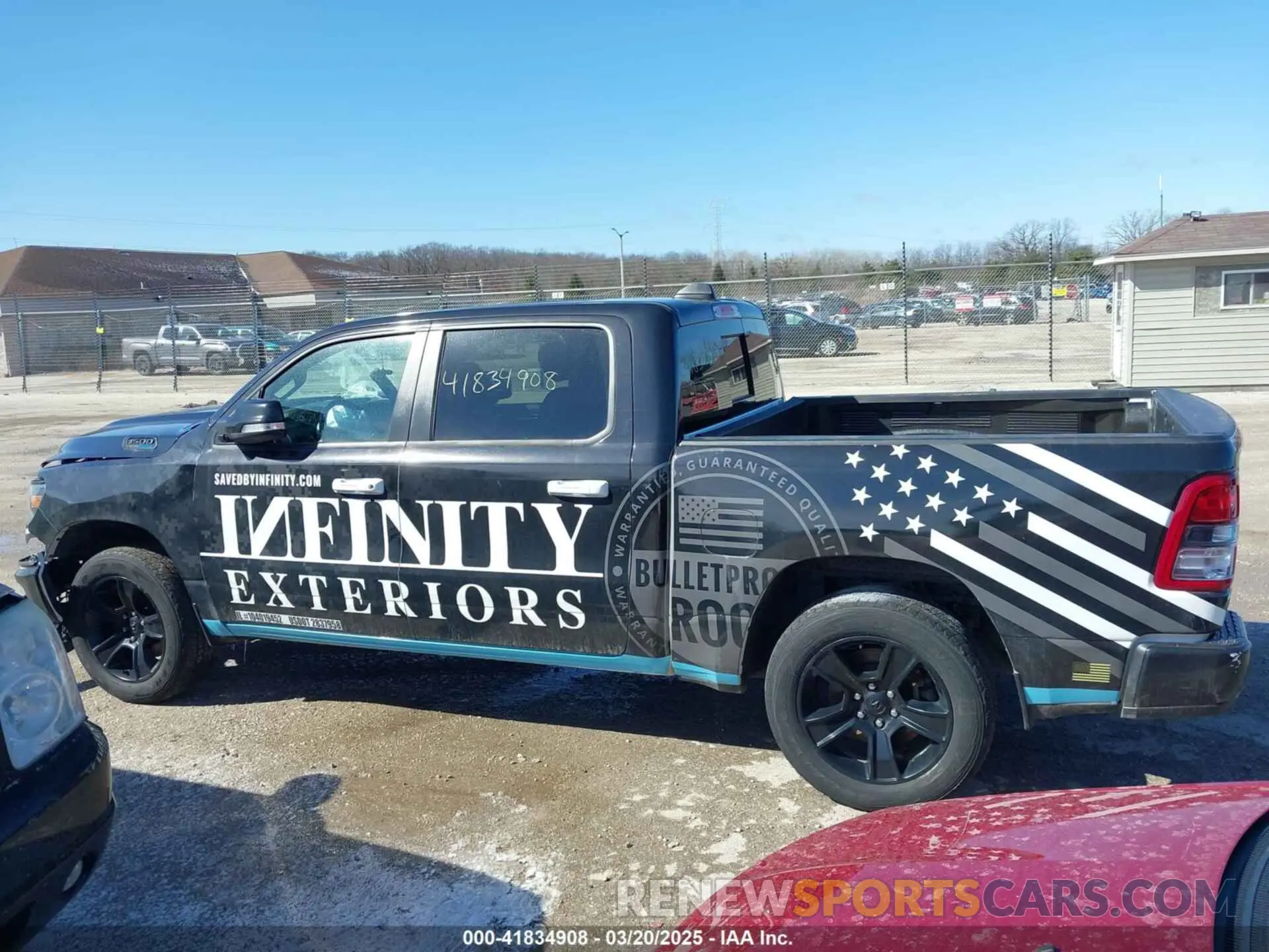 14 Photograph of a damaged car 1C6SRFFT8MN598163 RAM 1500 2021